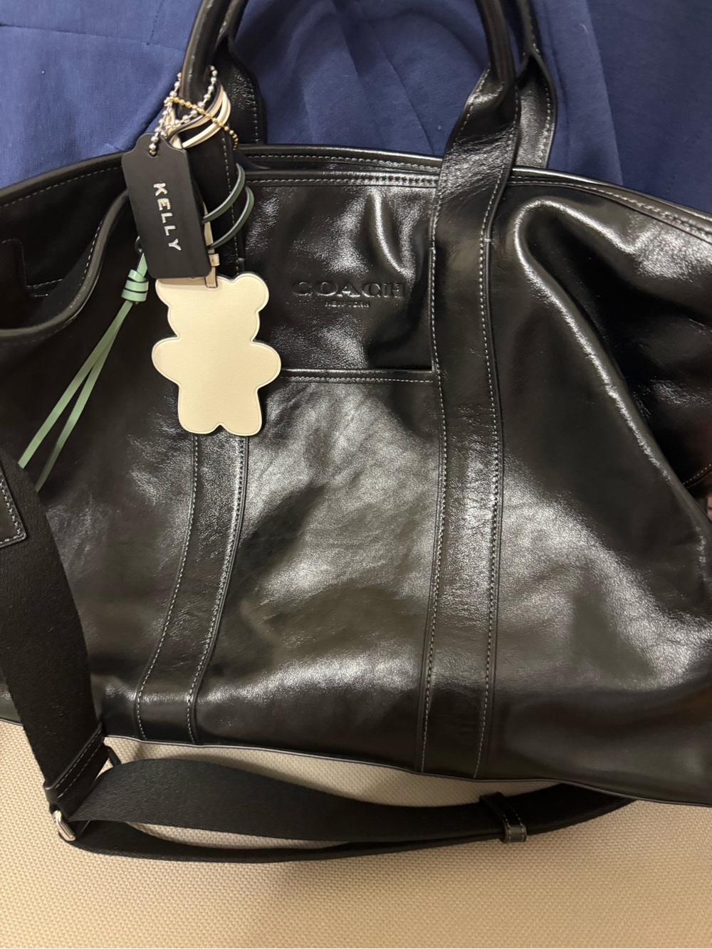 Coach Black Leather Travel Tote with Cream Bear Charm and Mint Accents